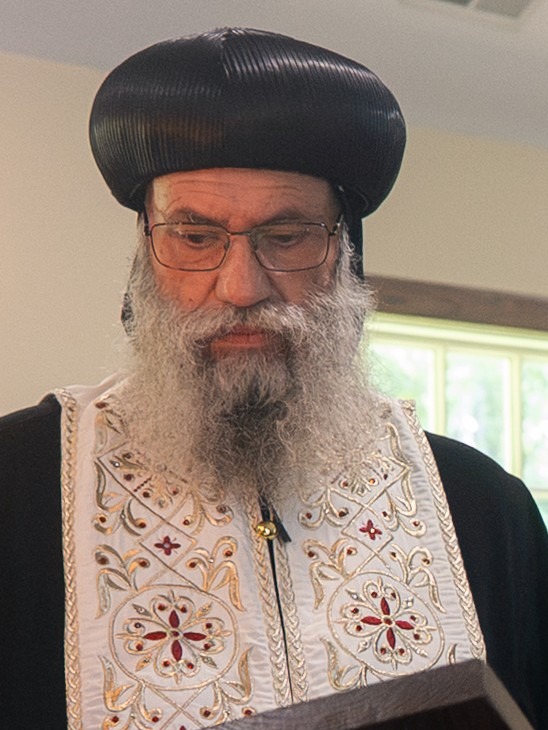 His Grace Bishop Suriel reading the Gospel at the lectern
