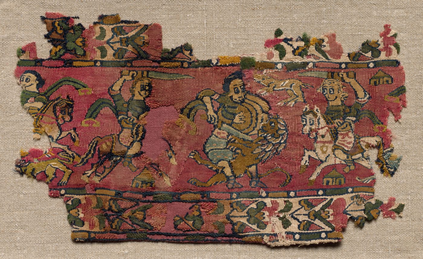 Woven textile band with riders and floral border